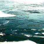 a river that has some ice on it